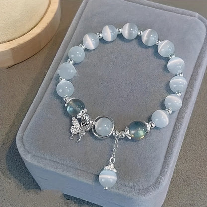 Elegant Cat Eye Stone Bracelet with Butterfly Charm Design