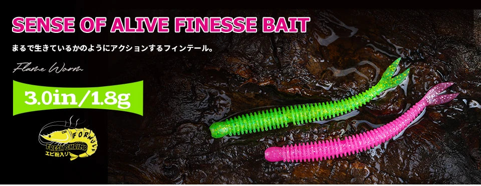 Two ribbed soft plastic fishing lures, green and pink, on wet rock, 3.0in 1.8g size.