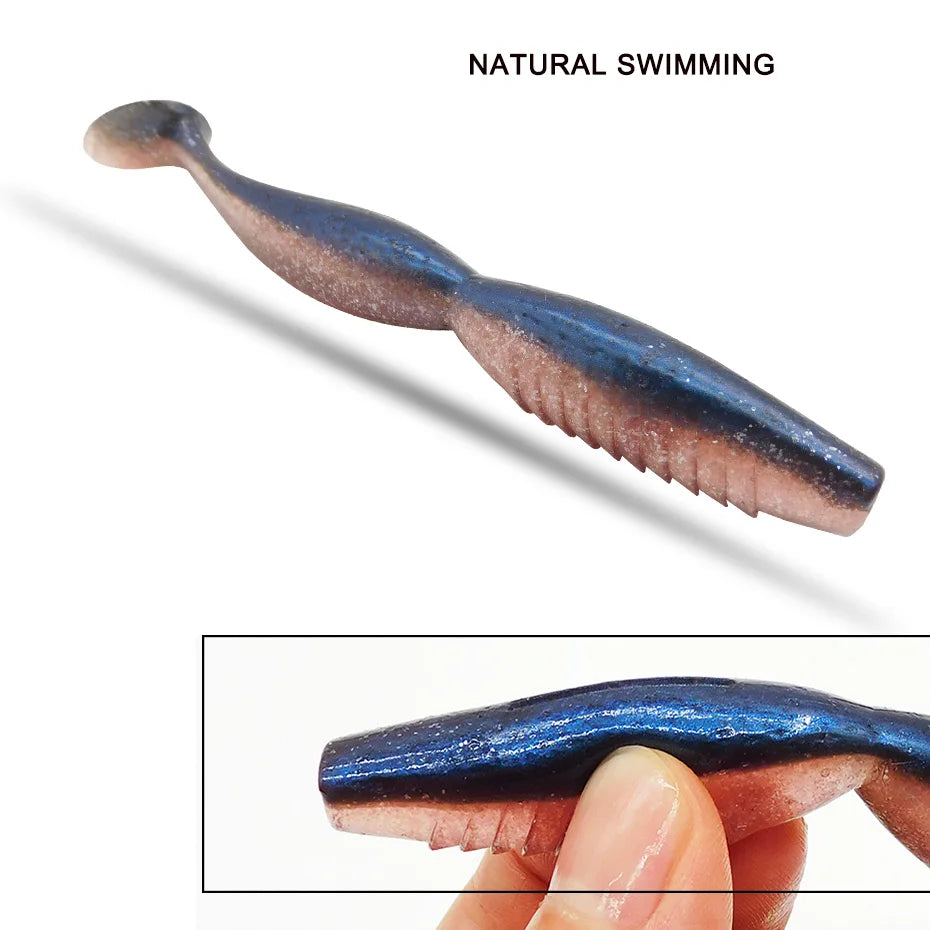 Blue and pink soft plastic fishing lure with ribbed body, shown for natural swimming action.