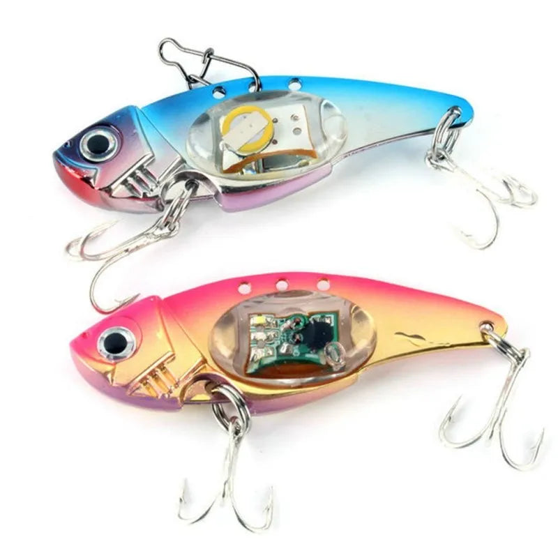 Two colorful fishing lures with electronic components on a white background