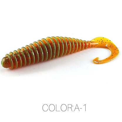 Curly tail soft plastic fishing lure in orange and green with ribbed body, color A-1.