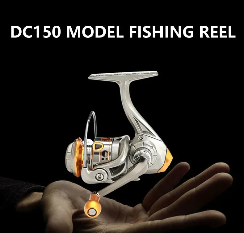 DC150 model fishing reel with silver and orange accents displayed above an open hand