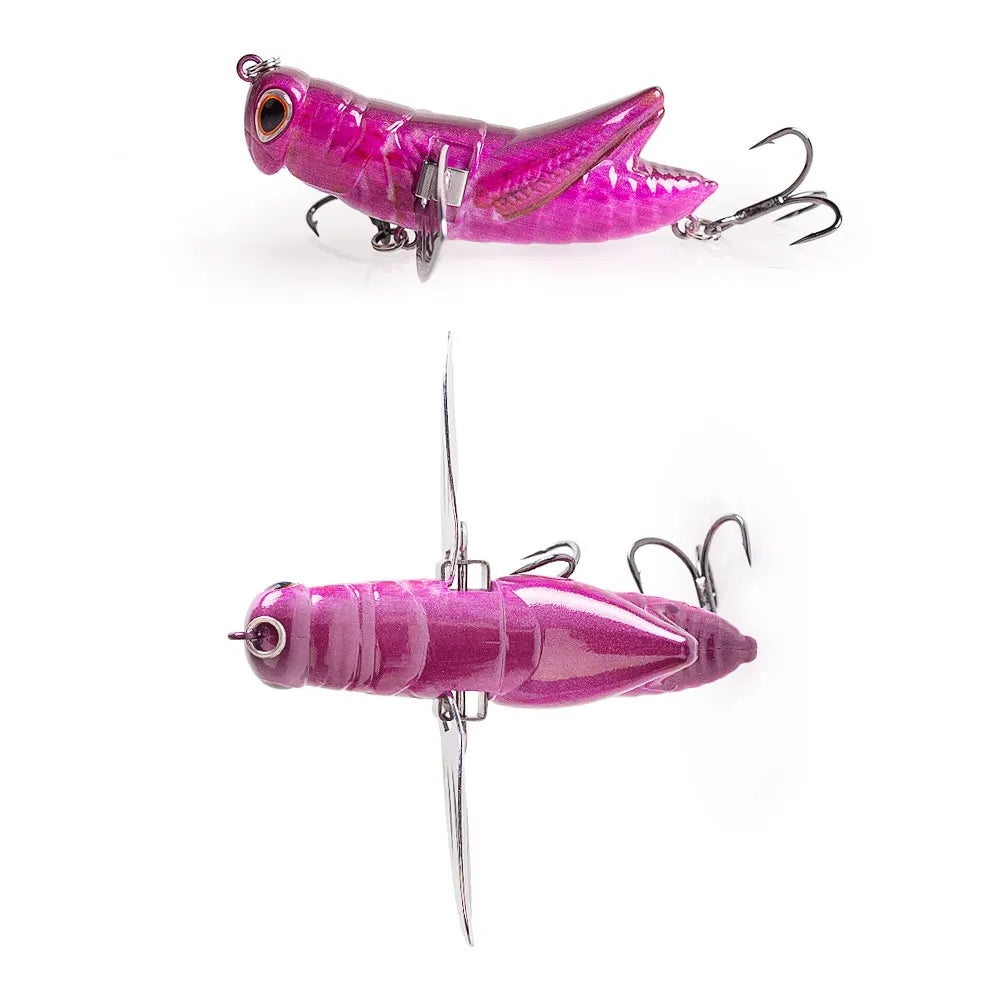 Pink grasshopper-shaped fishing lure with treble hooks and lifelike details, shown from two angles.