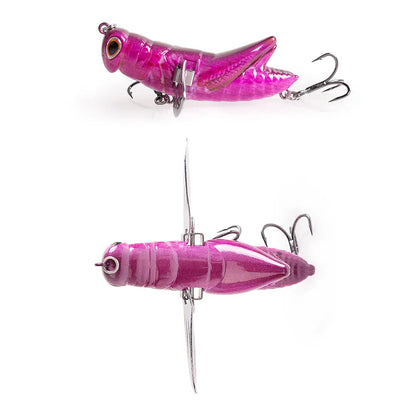 Pink grasshopper-shaped fishing lure with treble hooks and lifelike details, shown from two angles.