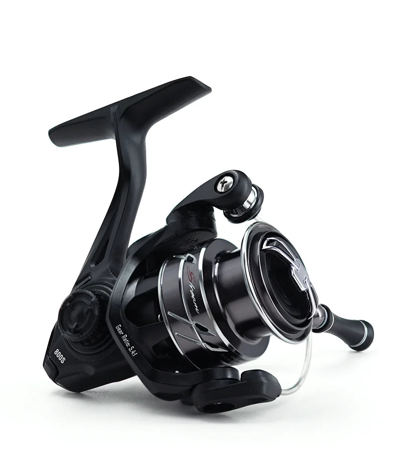 Black spinning fishing reel with metal accents for outdoor angling gear