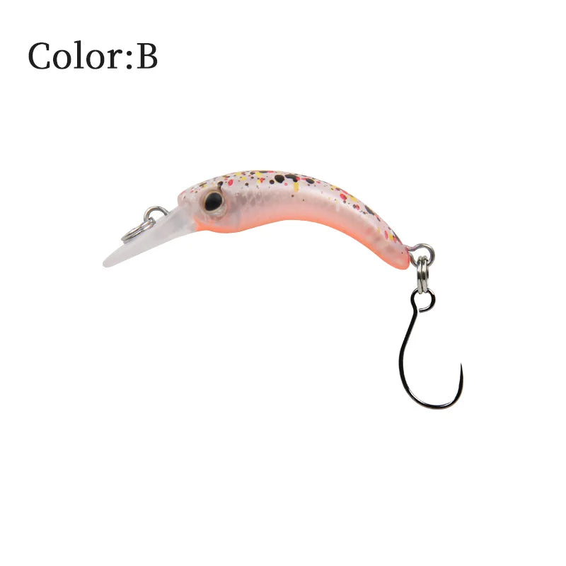 Curved pink fishing lure with black and yellow speckles, single hook, labeled color B