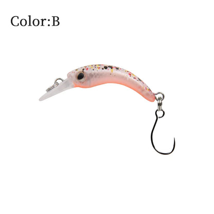 Curved pink fishing lure with black and yellow speckles, single hook, labeled color B