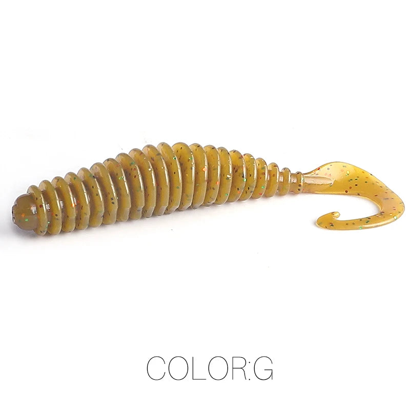 Curly tail soft plastic fishing lure in translucent yellow with colored speckles