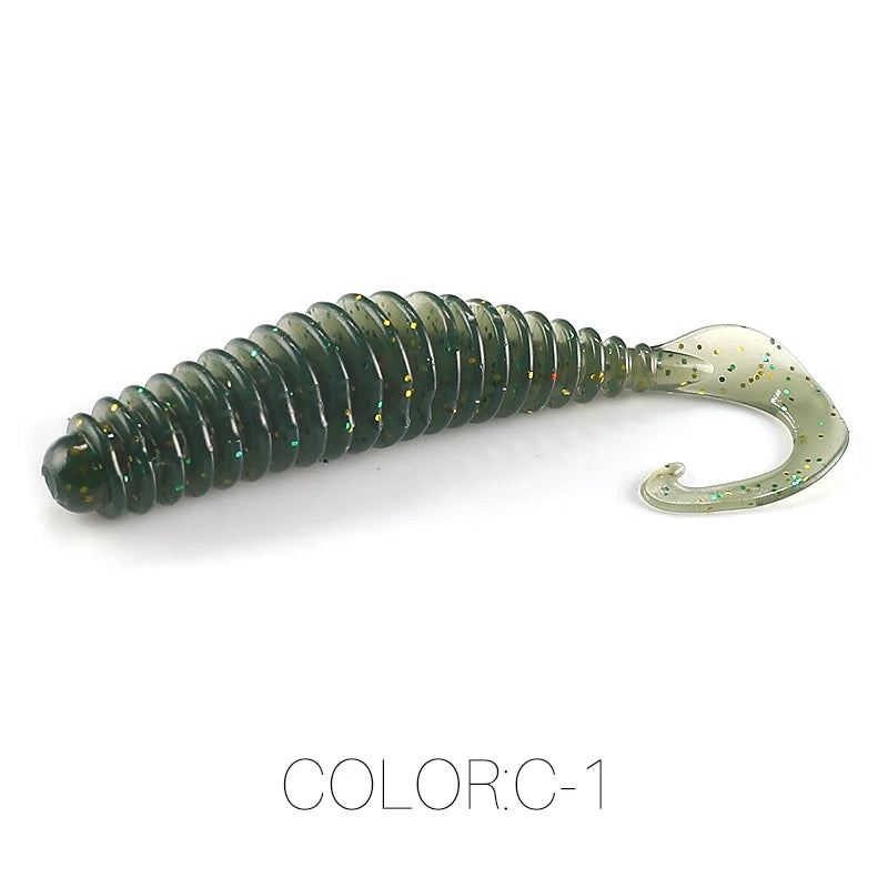 Green ribbed soft plastic fishing lure with curly tail and glitter accents, color C-1