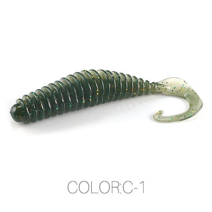 Green ribbed soft plastic fishing lure with curly tail and glitter accents, color C-1