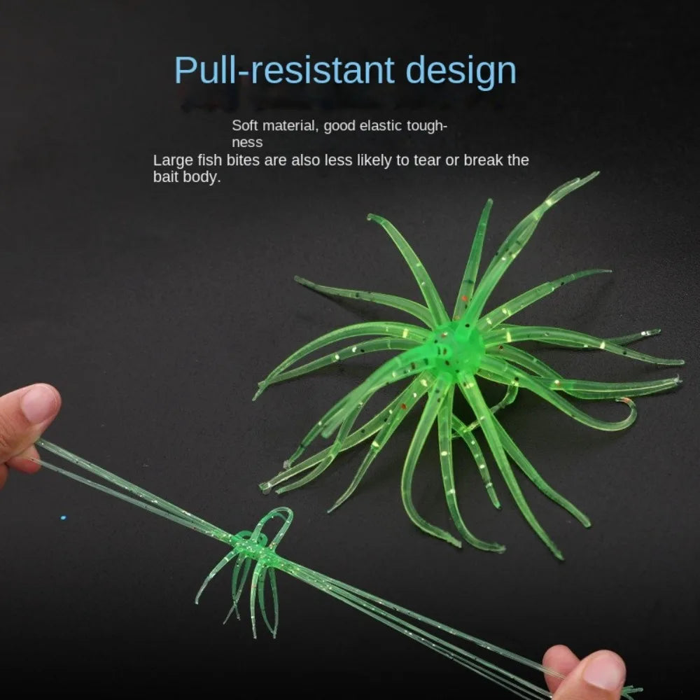 Green soft plastic fishing lure with multiple legs, shown being stretched and durable.
