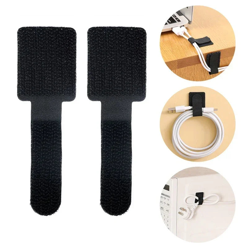 Set of 20 black hook-and-loop cable straps with textured grips for bundling cords neatly