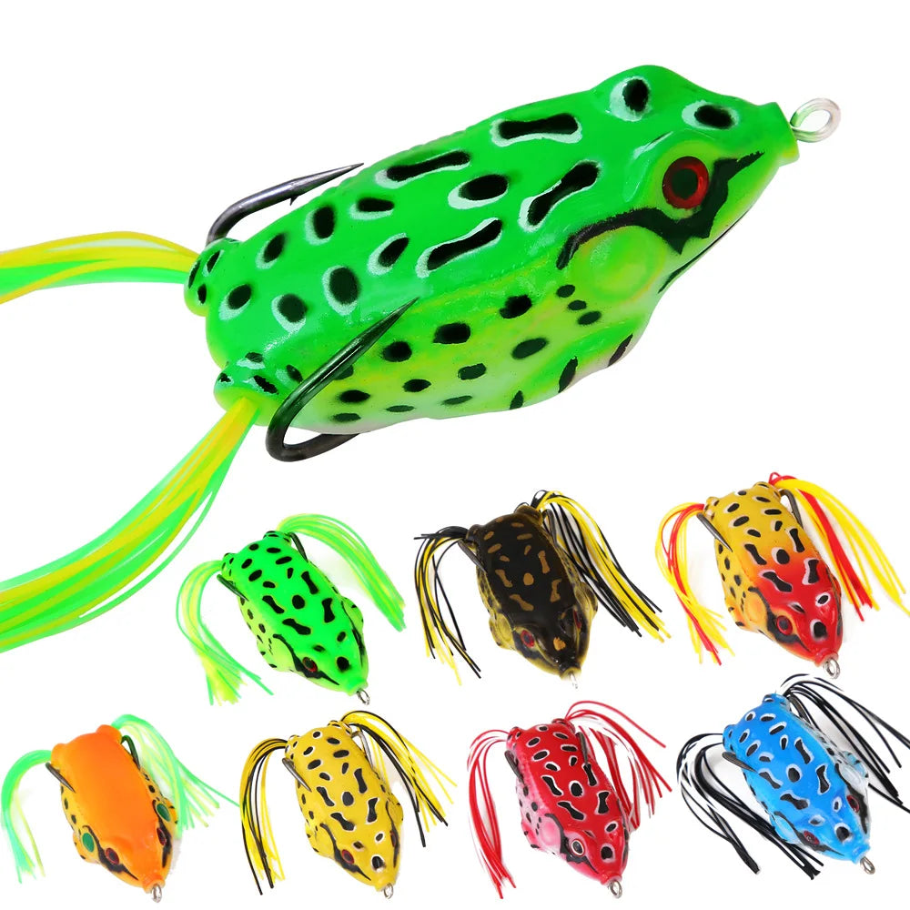 Assorted colorful frog-shaped fishing lures with realistic details and side hooks.