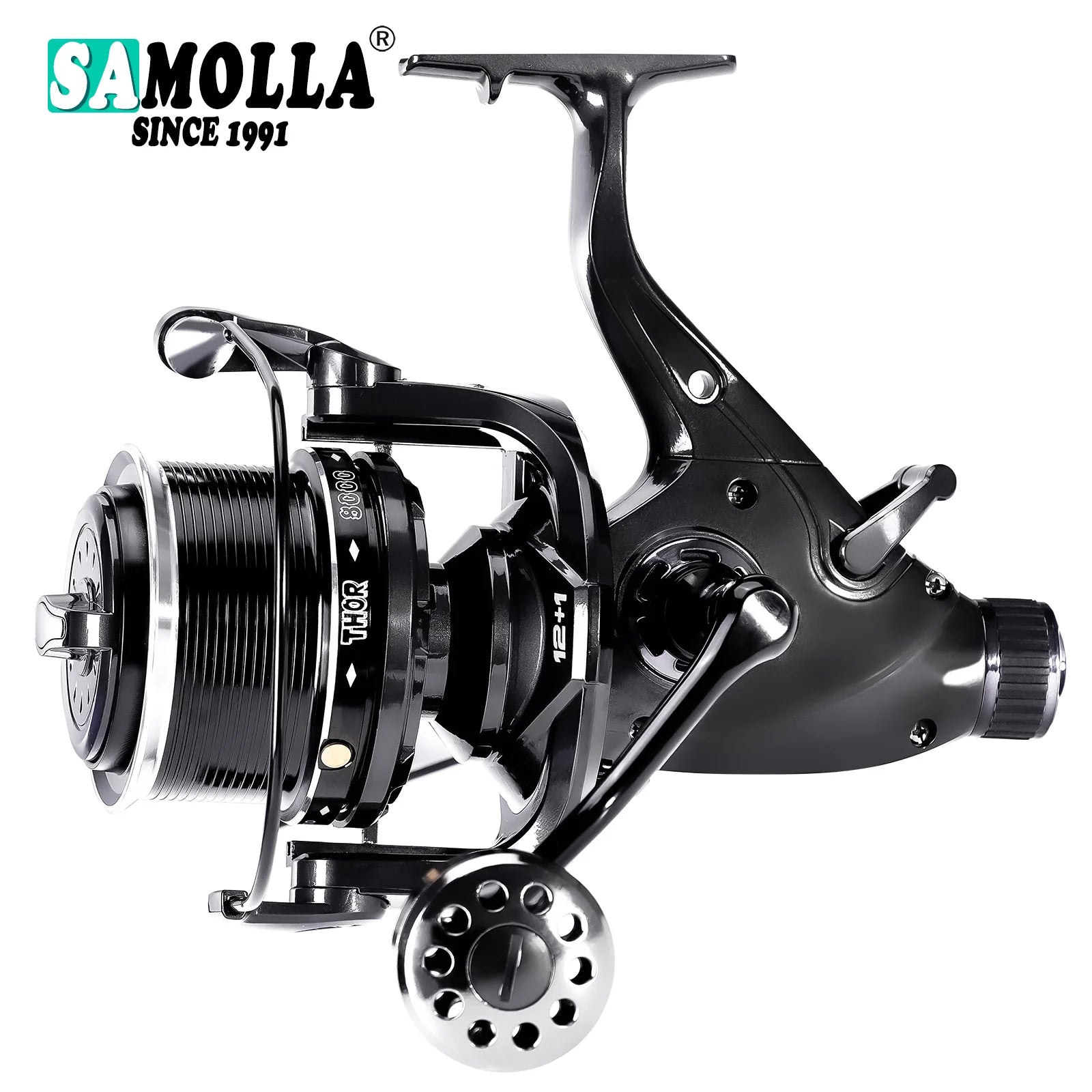 Close-up of a black and silver fishing reel with ergonomic handle and visible branding.