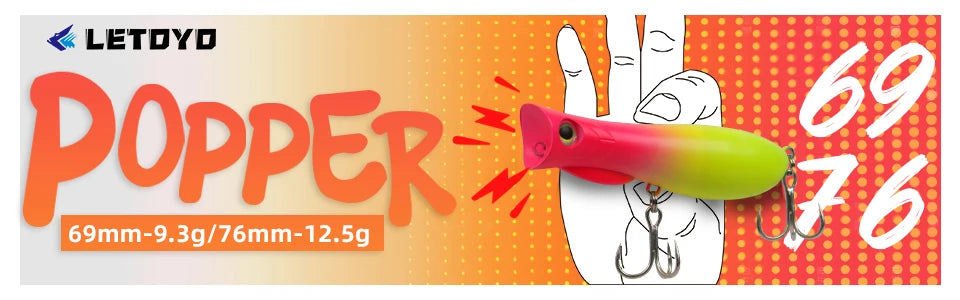 Colorful popper fishing lure with treble hooks, shown in front of vibrant orange graphic background.