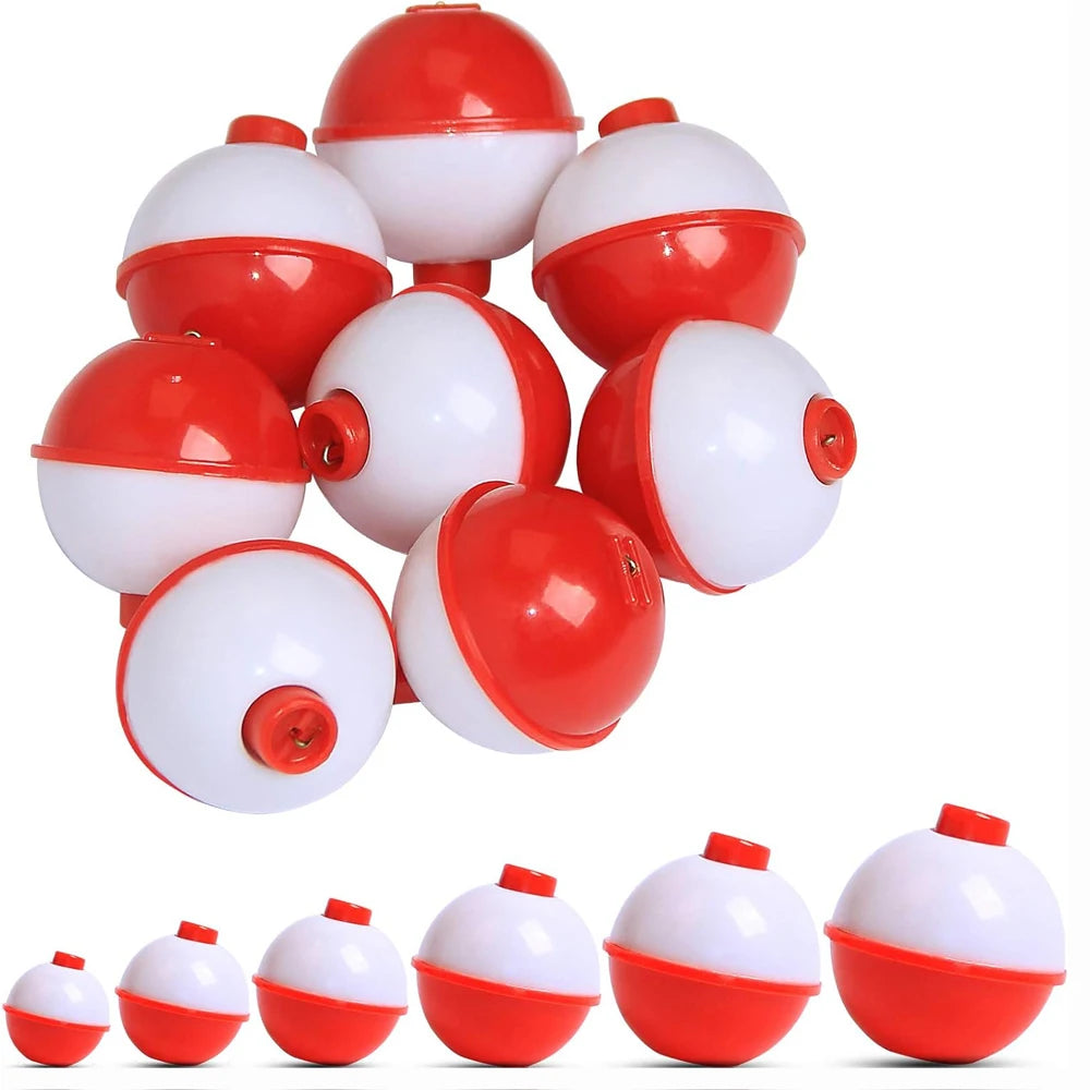 Assorted red and white fishing bobbers in multiple sizes for outdoor fishing gear
