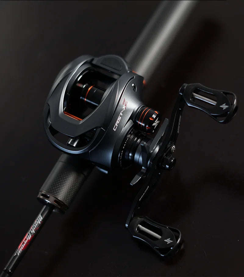 Close-up of a black baitcasting fishing reel on rod, outdoor gear for anglers