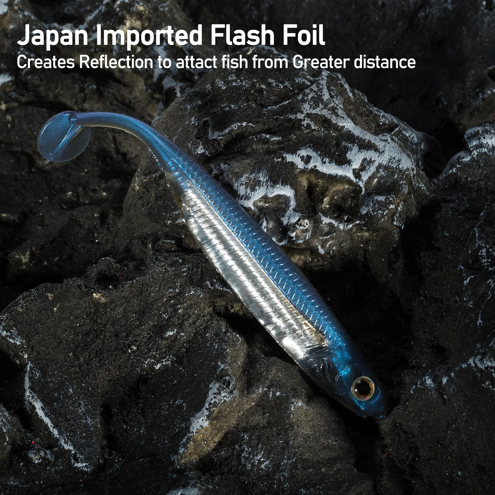 Blue and silver fishing lure with Japan imported flash foil on dark rocky surface