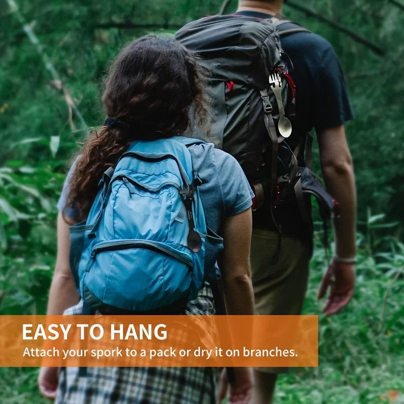 HookUpCo 5-in-1 survival tool shown on a backpack outdoors with carabiner and gear for camping.