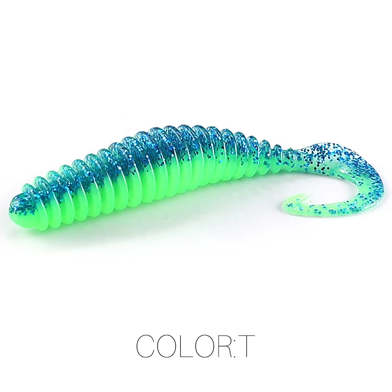 Green and blue ribbed soft plastic fishing lure with curly tail on white background
