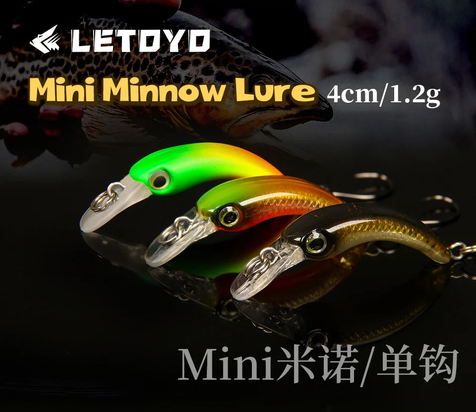 Three colorful mini minnow fishing lures, 4cm size, with hooks on black background