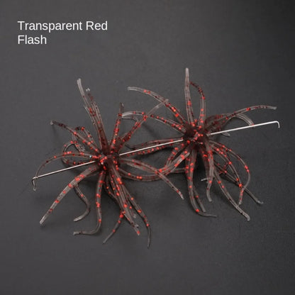 Transparent red flash soft bait lures with hook for fishing, shown on dark background