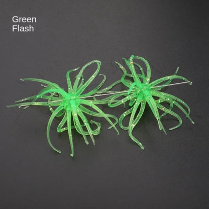 Two green silicone fishing lures with tentacles on a black background, labeled Green Flash.