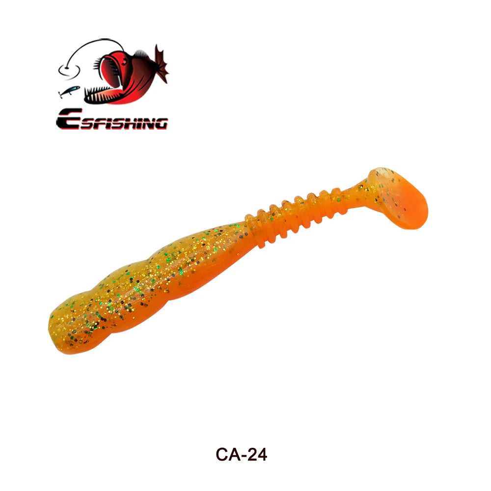 Orange glitter soft plastic fishing lure with paddle tail on white background