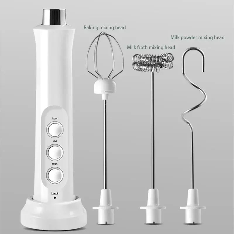 White handheld blender with interchangeable mixing heads on a gray background