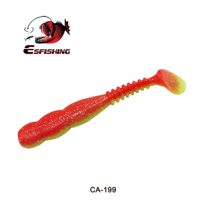 Red and yellow soft plastic fishing lure with paddle tail, isolated on white background.