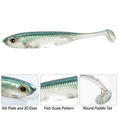 Realistic green and silver soft plastic fishing lure with 3D eyes, scale pattern, and paddle tail