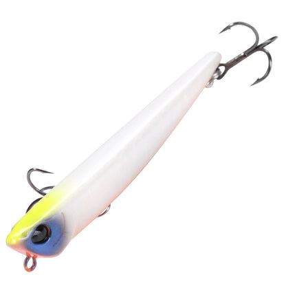 White and yellow fishing lure with treble hooks, outdoor fishing gear close-up