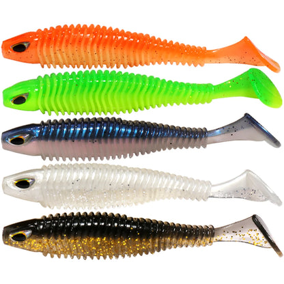 Set of five colorful soft plastic fishing lures with ribbed bodies and paddle tails