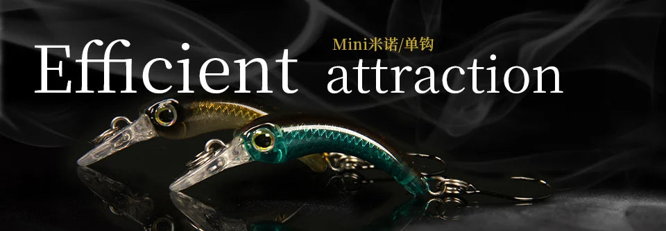 Two mini fishing lures with realistic fish designs on a dark background with smoke effect