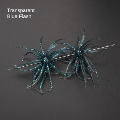 Transparent blue flash soft plastic fishing lure with glitter tentacles on black background