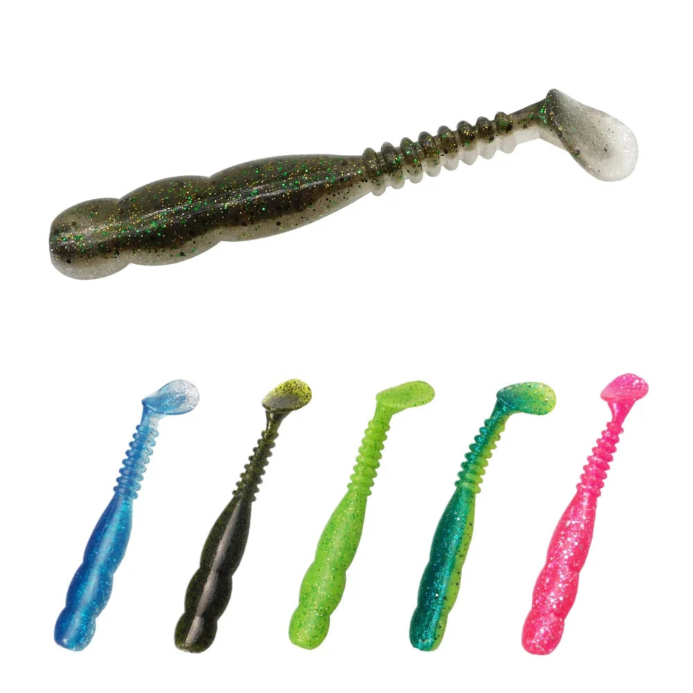 Set of five soft plastic fishing lures in various colors with paddle tails, ideal for freshwater fishing.