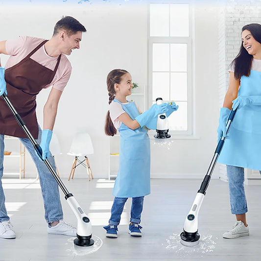 Family of three cleaning a floor with a robot vacuum cleaner in a bright room.