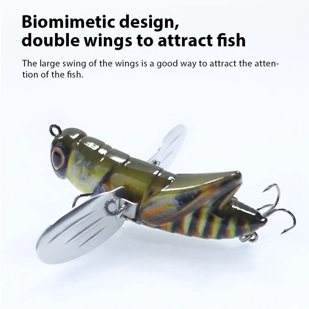 Realistic insect-shaped fishing lure with double metal wings and treble hooks on white background.