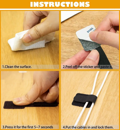 Black reusable hook-and-loop cable straps shown being pressed and wrapped around white cords on a wooden surface.