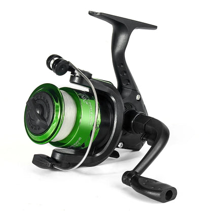 Green and black spinning fishing reel with handle, outdoor fishing gear on white background