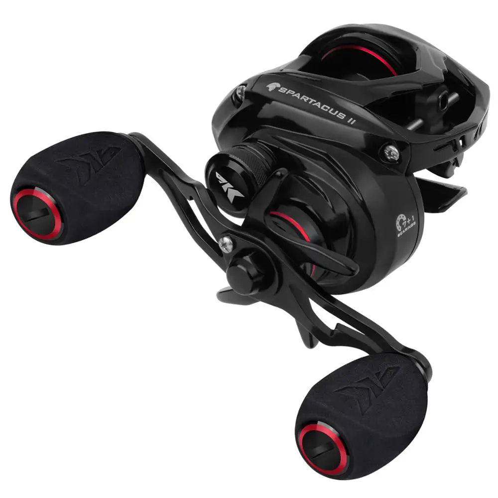 Black baitcasting fishing reel with red accents and ergonomic handles, outdoor gear
