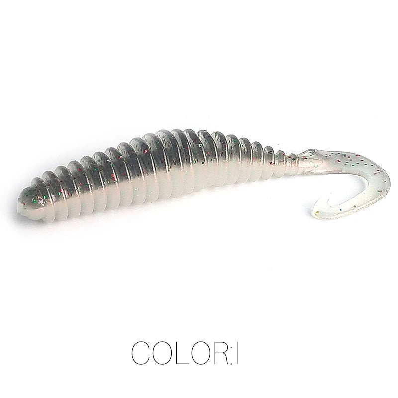 Soft plastic grub fishing lure with ribbed body and curled tail, color I, on white background