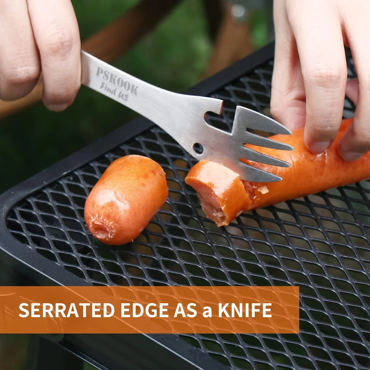 Stainless steel survival tool blade with serrated edge held in hand over orange knife-assisted cutting.