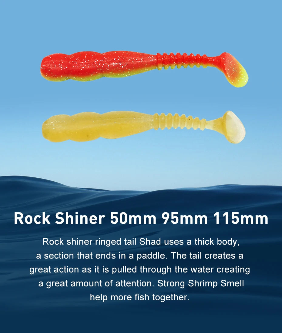 Two soft plastic paddle tail fishing lures, one red-yellow and one yellow, on blue background.