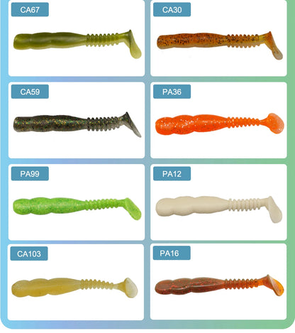 Assorted soft plastic fishing lures in various colors, paddle tail design, labeled with codes.