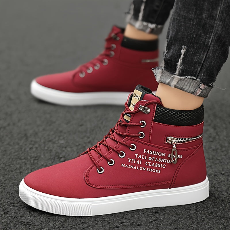 Red high-top sneakers with white soles worn by a person on a gray surface