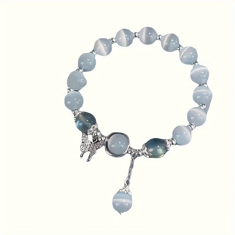 Elegant Cat Eye Stone Bracelet with Butterfly Charm Design